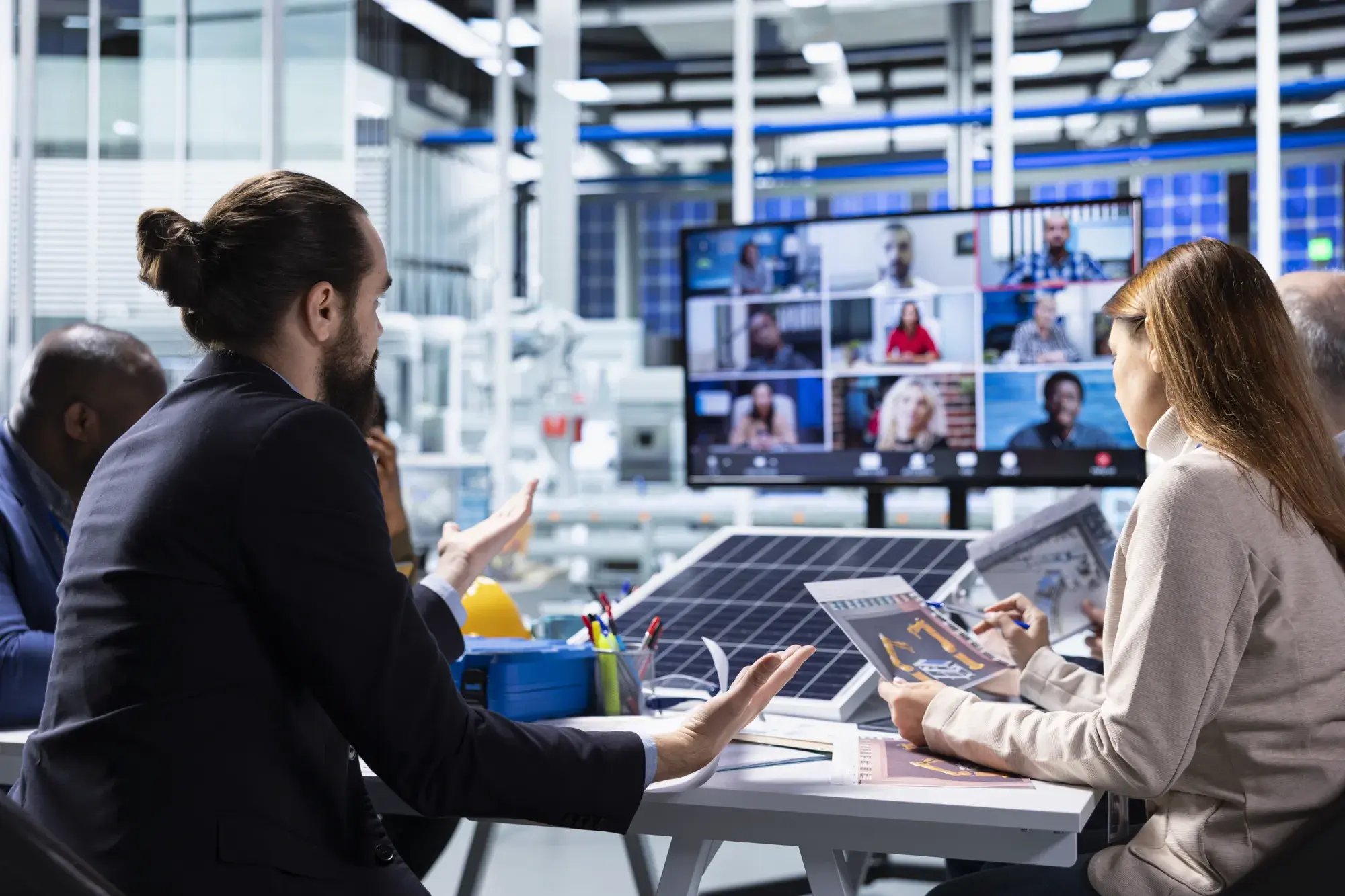photovoltaics-factory-managers-look-schematics-online-videocall