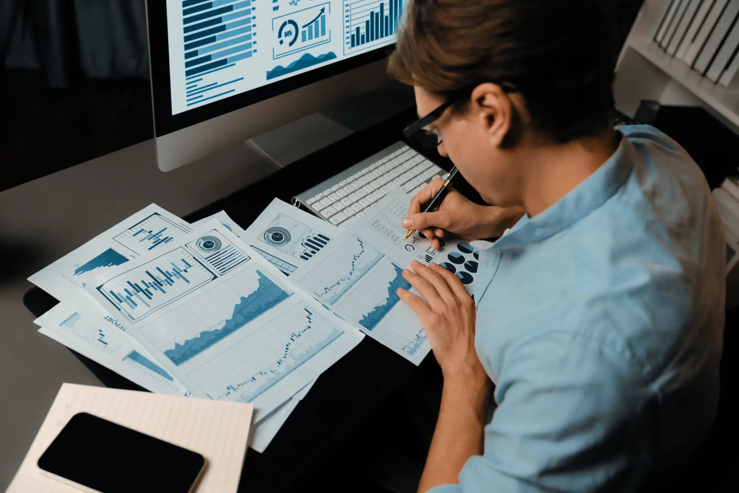 thinking-smart-businessman-surrounded-paperwork-report-paragraph-pecuniary